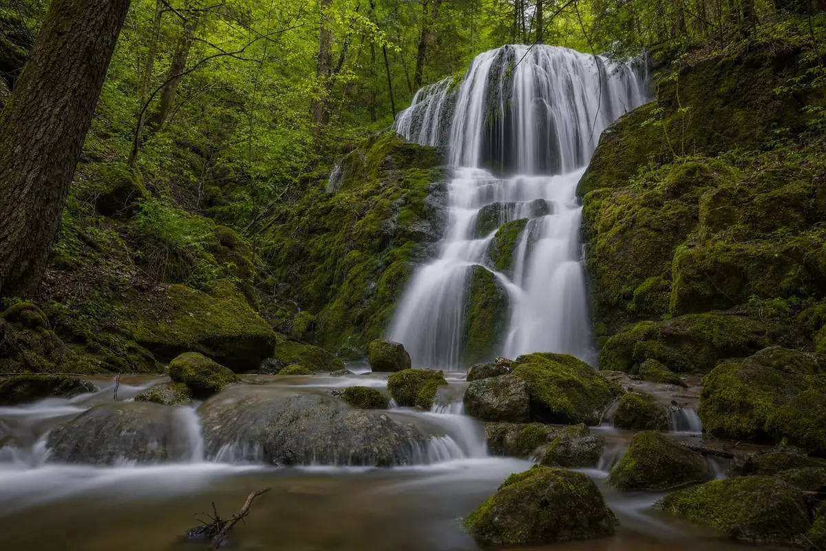 Long-exposure photo of a silky waterfall created with a slow shutter speed